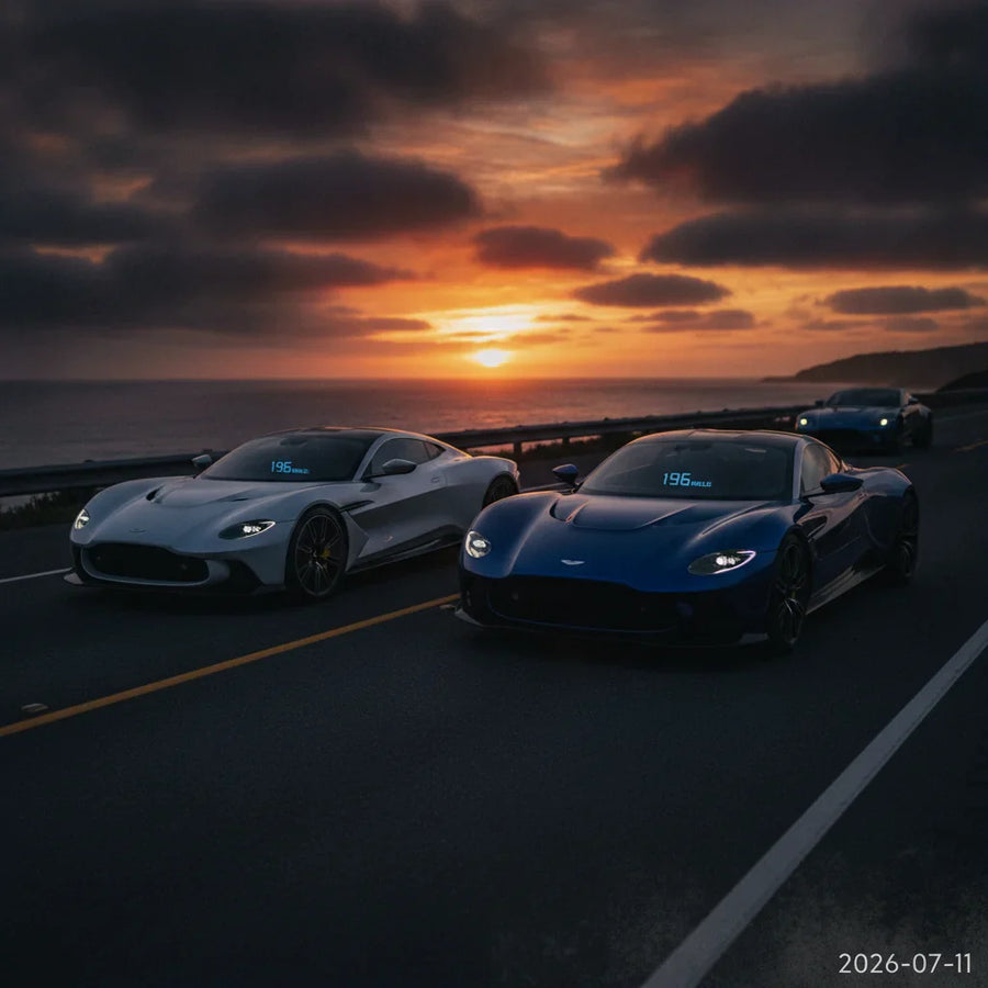 Editorial photo-realistic HERO image for automotive news (2026-07-11). Feature Aston Martin vehicles specifically Valhalla. Scene: A stunning sunset b