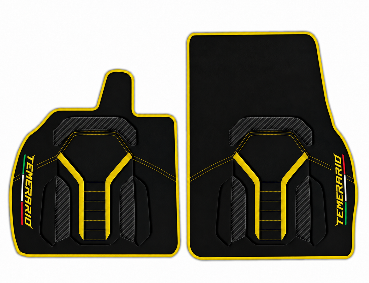 A pair of black car floor mats with yellow trim and textured center panels, featuring the word 'TEMPERARIO' printed vertically on the sides.