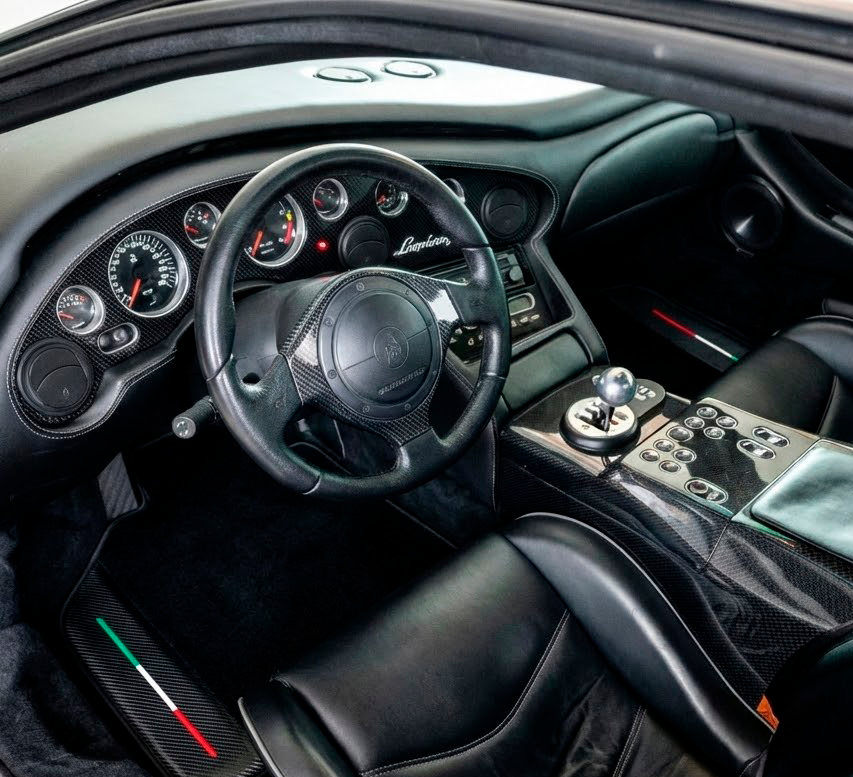 Anpassbare schwarze Fußmatten für Lamborghini Diablo (1990-2001) mit Carbonfaser